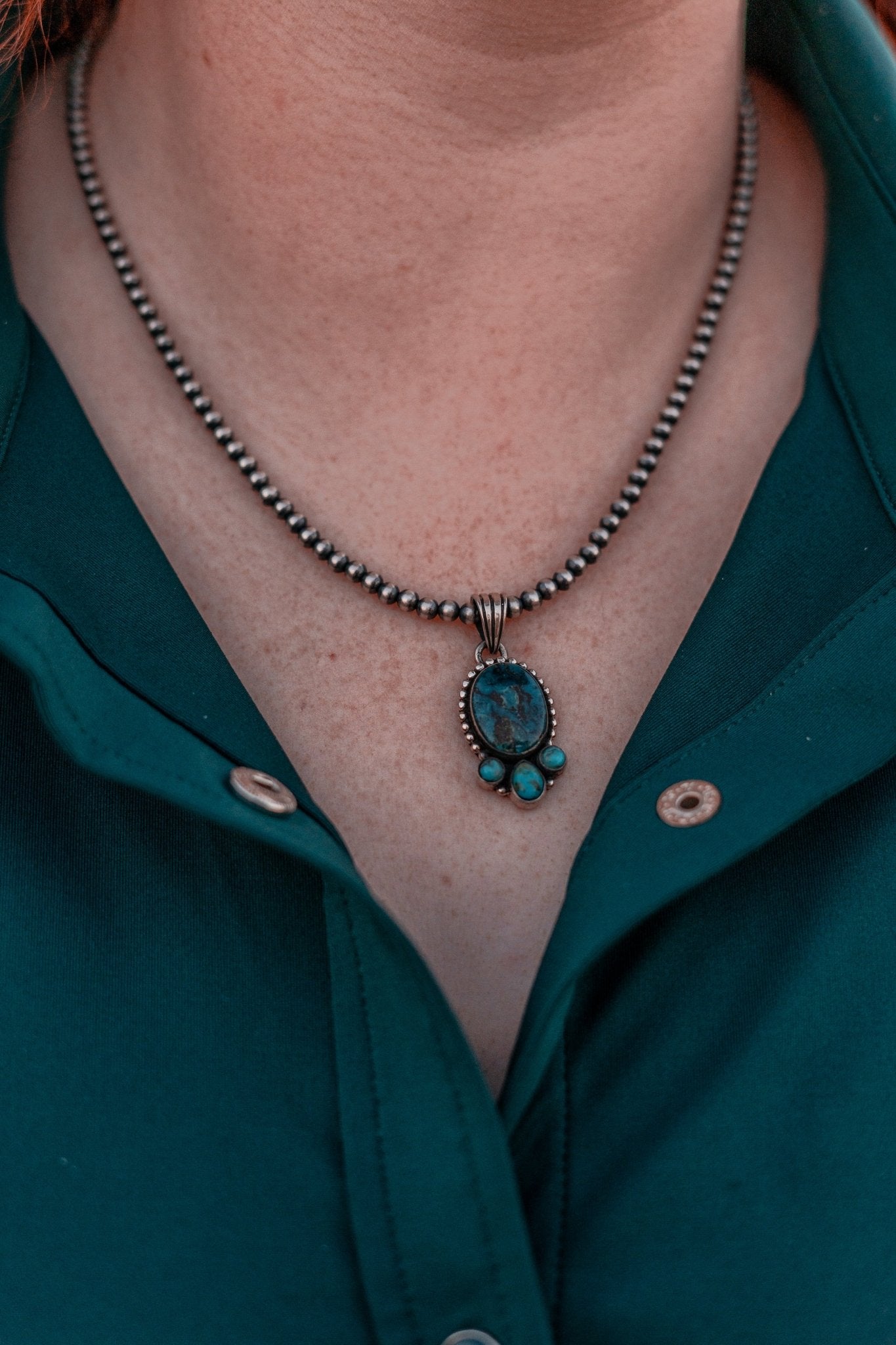Dark Kingman Turquoise Pendant on Navajo Pearls - 9greyhorses.comJewelry